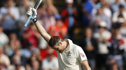 Steve Smith celebrates making a century against England