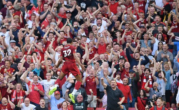 Joel Matip celebrates his goal against Arsenal.