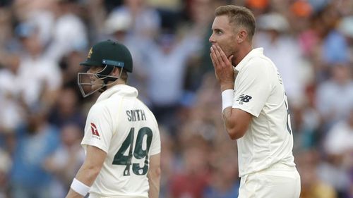 Stuart Broad celebrates the wicket of Tim Paine