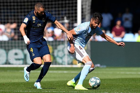 Karim Benzema (left) scored Real&#039;s first La Liga goal of the campaign during their 3-1 win over Celta Vigo