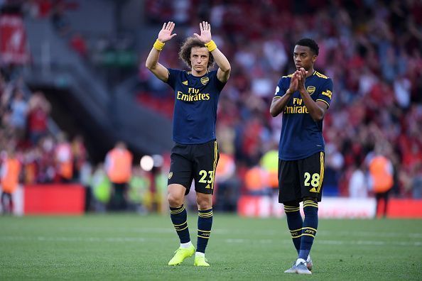 David Luiz apologetically applauds the travelling Arsenal supporters after a grim defensive display