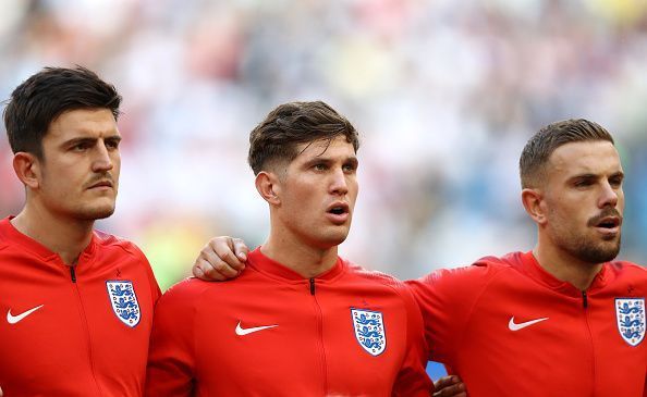 Harry Maguire (left), John Stones (middle) and Jordan Henderson (right) during international duti