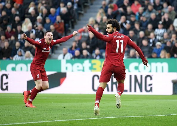 Mohamed Salah rejoices after scoring a Premier League goal for Liverpool