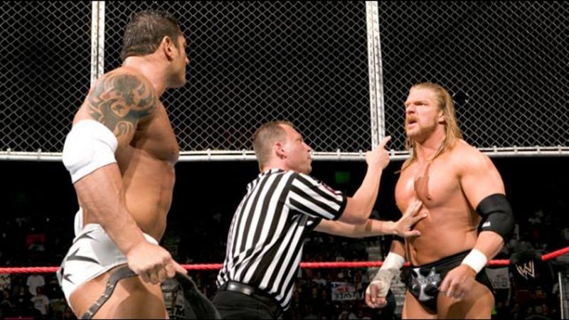 Batista and Triple H in action