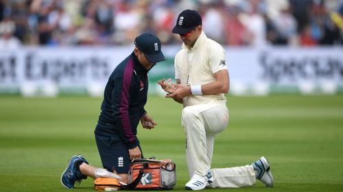 James Anderson receives treatment at Edgbaston