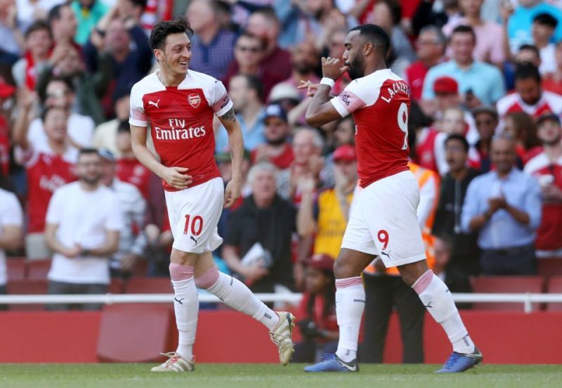 Mesut Ozil (left) and Alexandre Lacazette (right) may feature against Burnley