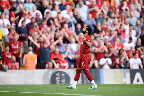 Mohamed Salah celebrates as he netted a well-taken brace during Liverpool's 3-1 win over Arsenal