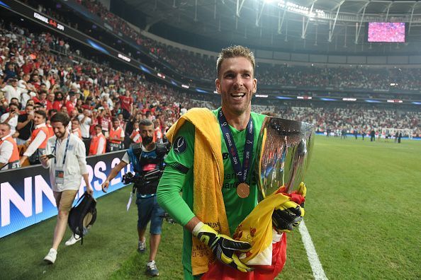 Adrian holding the Super Cup with pride