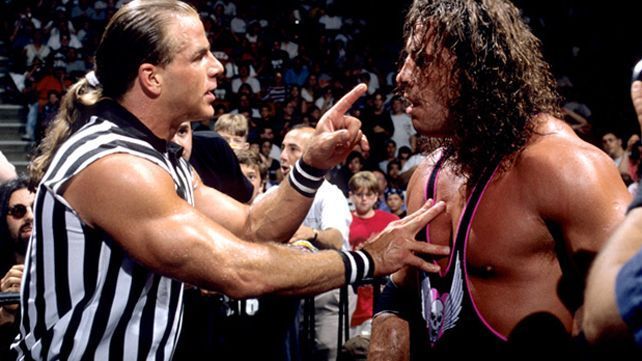 Special Referee, Shawn Michaels has words with Bret Hart in the SummerSlam 1997 headliner