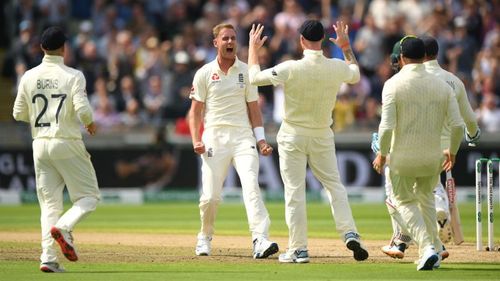 Stuart Broad celebrates his dismissal of David Warner