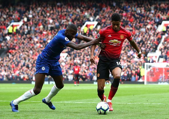 Antonio Rudiger jostling with Rashford in a game from last season