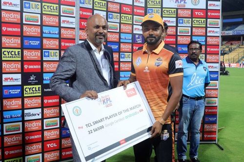 KB Pawan receiving a 'Man of the Match' award for a fifty against Shivamogga earlier in the season