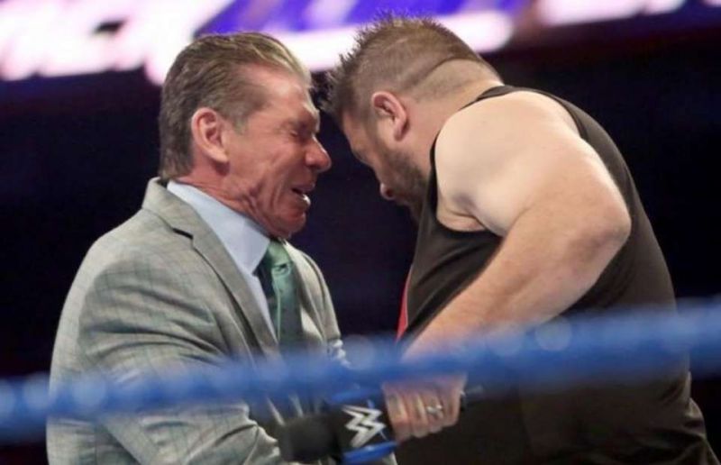 Kevin Owens headbutting Vince McMahon on SmackDown