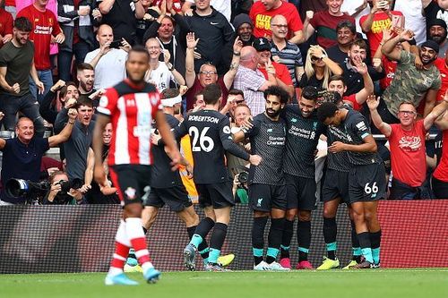 Liverpool players celebrate Roberto Firmino's goal in a hard-fought 2-1 away win against Southampton