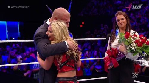 Triple H with Toni Storm at WWE Evolution