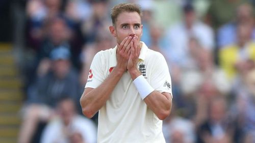 Stuart Broad celebrates the wicket of Tim Paine