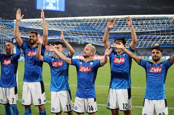 Napoli players celebrate in front of their fans