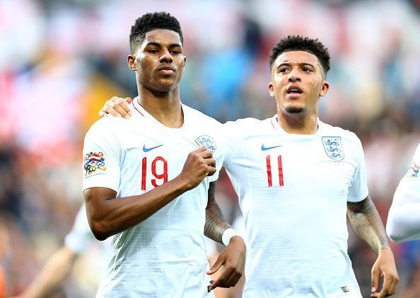 Jadon Sancho(right), alongside Manchester United&#039;s Marcus Rashford.