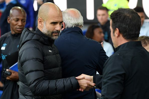 Pep Guardiola (left) has a defensive headache.