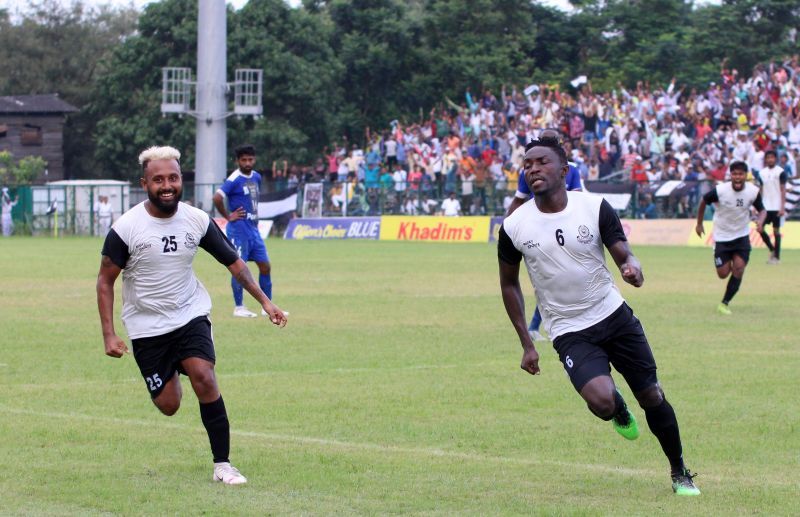 Mohammedan players celebrate a goal on Monday.