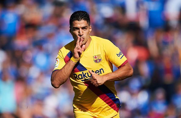 Barcelona&#039;s Luis Suarez celebrates after scoring