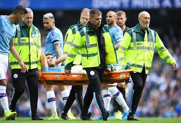 Manchester City&#039;s Aymeric Laporte being stretchered off
