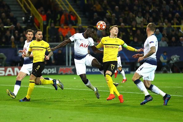 Marco Reus (centre) was a happy man as he scored a brace against Leverkusen.