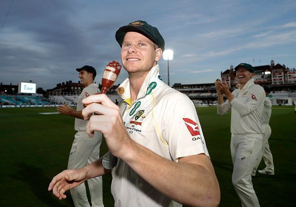 Steve Smith with the urn.