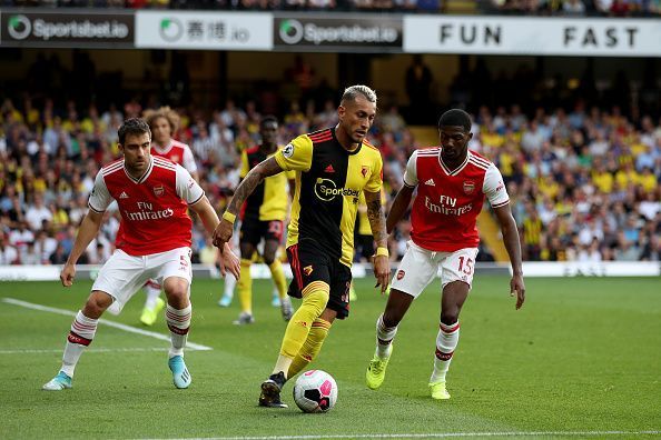 Sokratis (L) let Watford back into the match