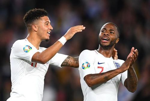 Sancho and Sterling celebrate one of their goals during England's 5-3 win over Kosovo