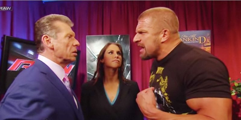 Vince McMahon and Triple H argue as Stephanie watches on