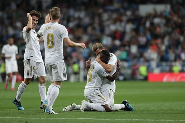 Real Madrid&#039;s players celebrate the opening goal