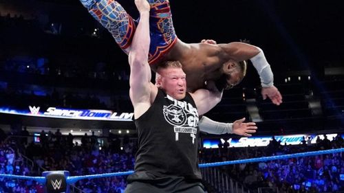 Kofi accepted Lesnar's challenge to take a flight to Suplex City