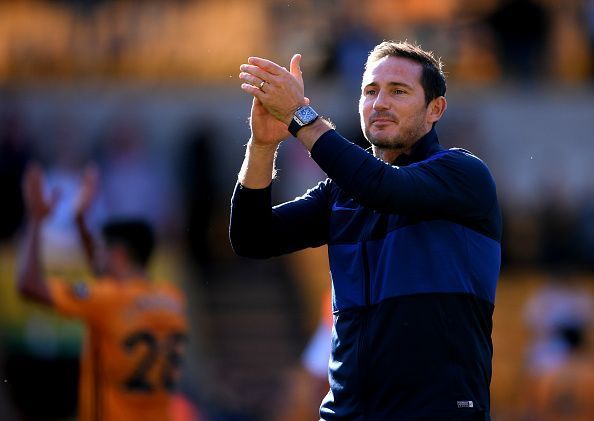 Frank Lampard applauds the travelling fans