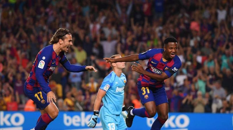 Young Ansu Fati celebrates his goal against Valencia