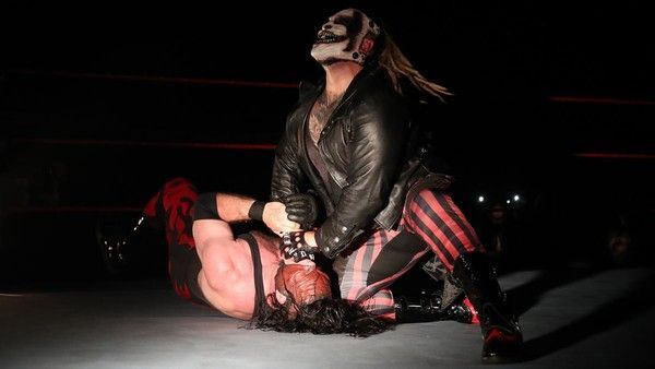 The Fiend puts Kane down