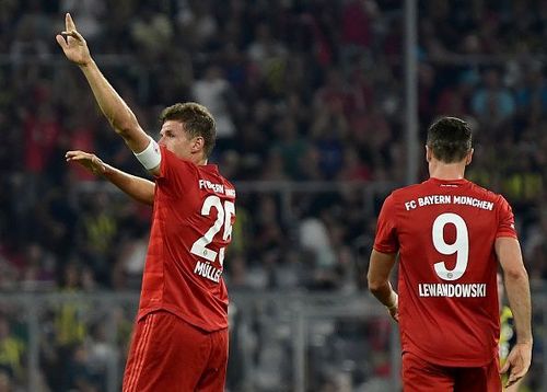 Bayern Muenchen's Thomas Muller and Robert Lewandowski