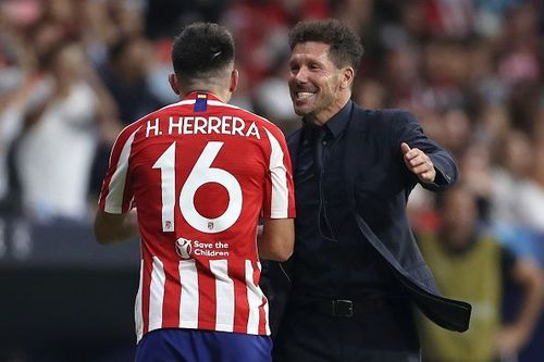 Atletico Madrid's Hector Herrera and Diego Simeone celebrate their last gasp equaliser!