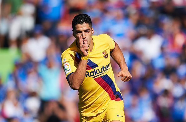 Luis Suarez opened the scoring against Getafe with a lobbed finish