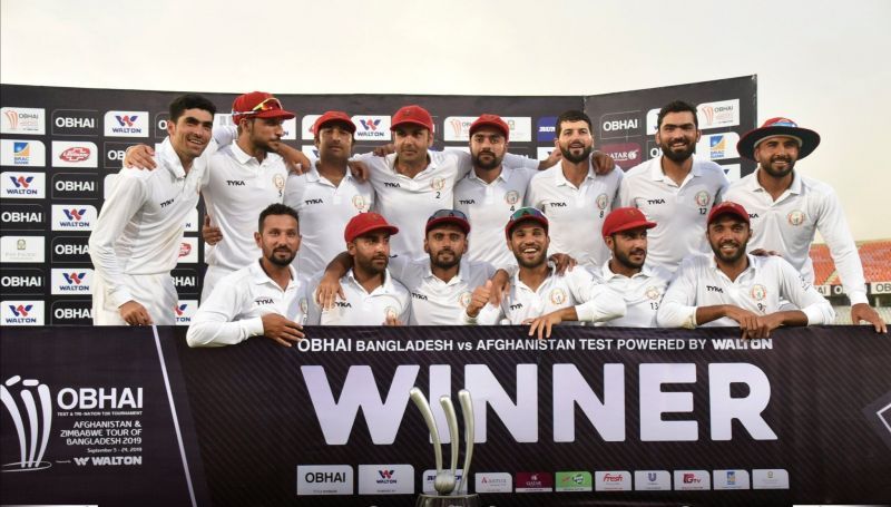 Afghanistan players with the winners&#039; trophy.