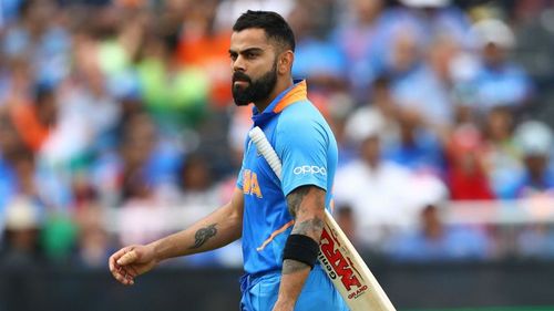 India captain Virat Kohli walks off