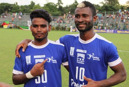 Ansumana Kromah (right), Peerless'goal-scoring hero.