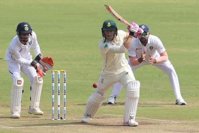 Faf du Plessis punches through covers.