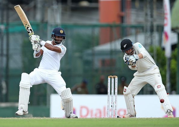 Dimuth Karunaratne (left)