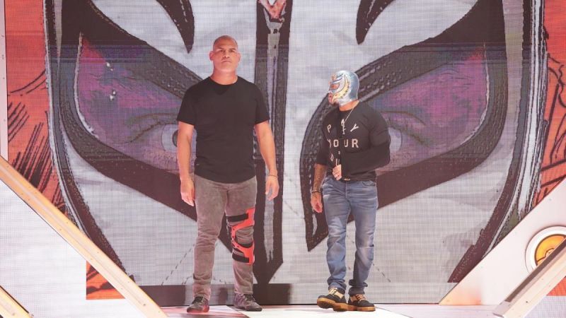 Cain Velasquez and Rey Mysterio