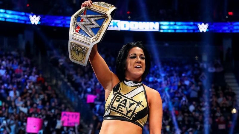 Bayley holding her newly won SmackDown Women's Championship