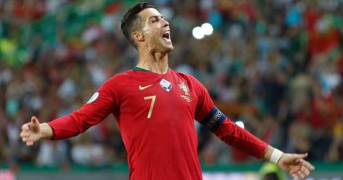 Ronaldo exults after scoring against Luxembourg in a UEFA Euro 2020 Qualifier in Lisbon