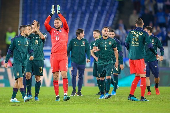 Italy players celebrate after beating Greece in Rome.