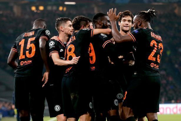 Chelsea celebrate their winner against Ajax at the Johan Cruyff Arena.