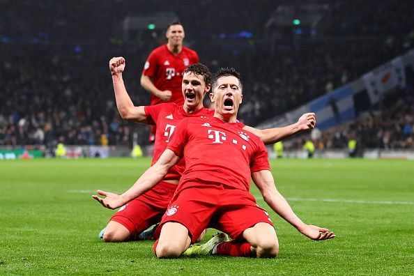 Lewandowski celebrates his razor-sharp finish with Benjamin Pavard and Niklas Sule behind him